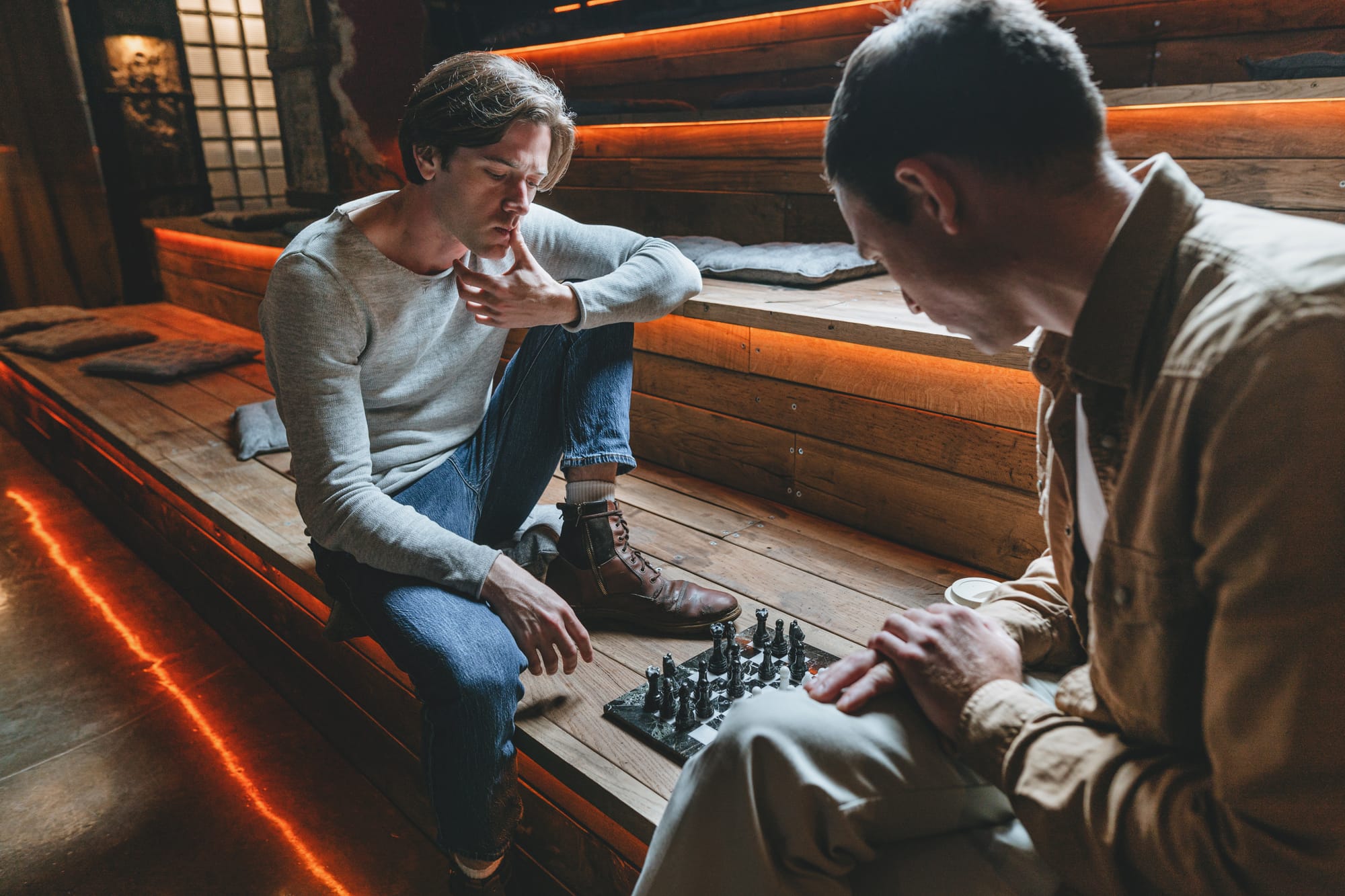 Two mature adults playing chess - asynchronous gaming for silver gamers