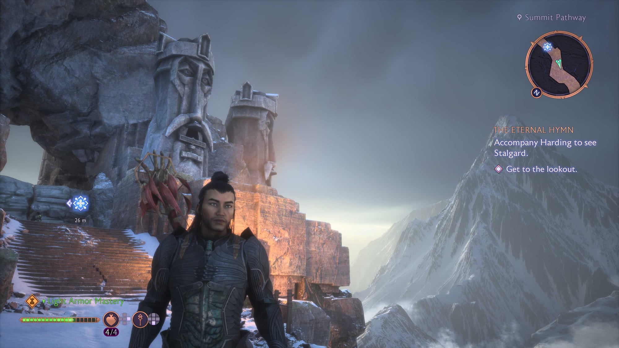 A necromancer wearing a dark grey armor, in front of snowy mountains